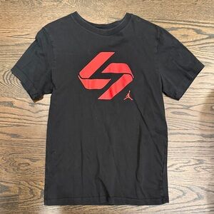 Jordan Black Tee with Striking Red Graphic